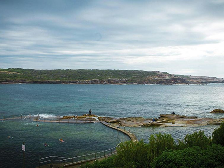 People swimming in the rockpool, Malabar Headland National Park. Photo: Chad Weston/OEH