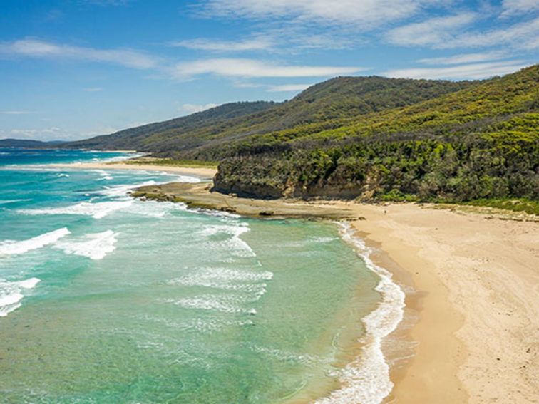 Aerial view of Pretty Beach, Murramarang National Park. Credit: John Spencer &copy; DPE