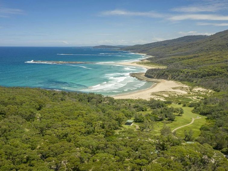 Aerial shot of Pretty Beach and picnic area in Murramarang National Park. Photo credit: John