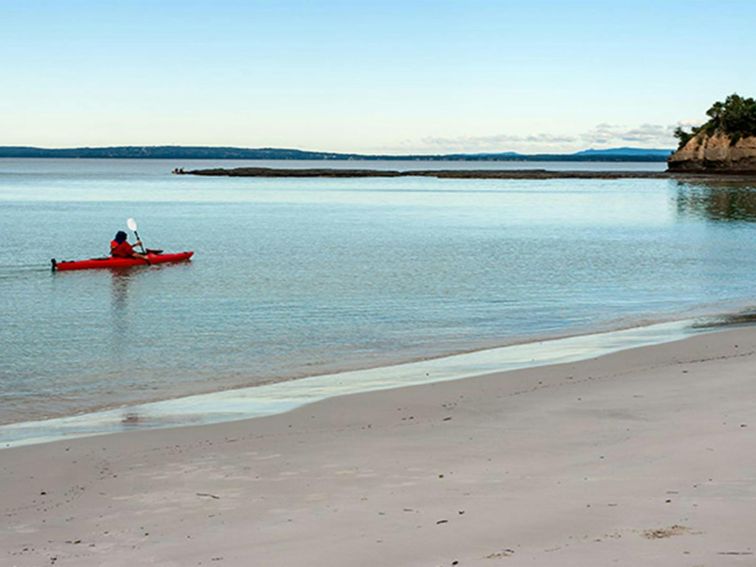 A kayaker at Red Point in Jervis Bay National Park. Photo: Michael Van Ewijk &copy; DPIE