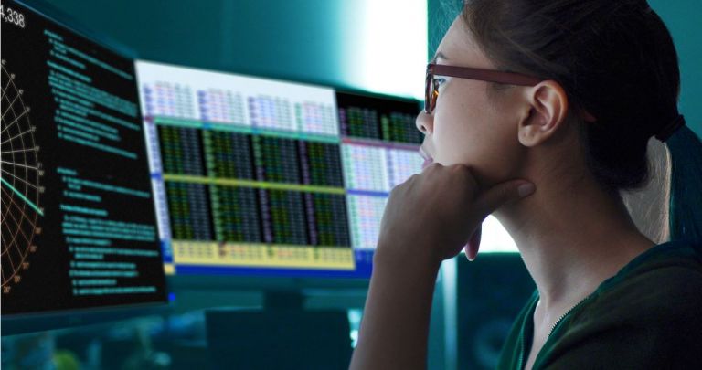 Woman looking at computer screen