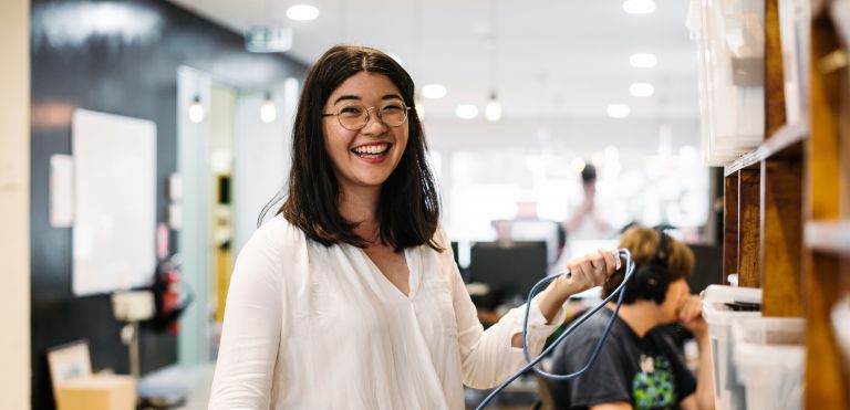 Woman smiling in an office