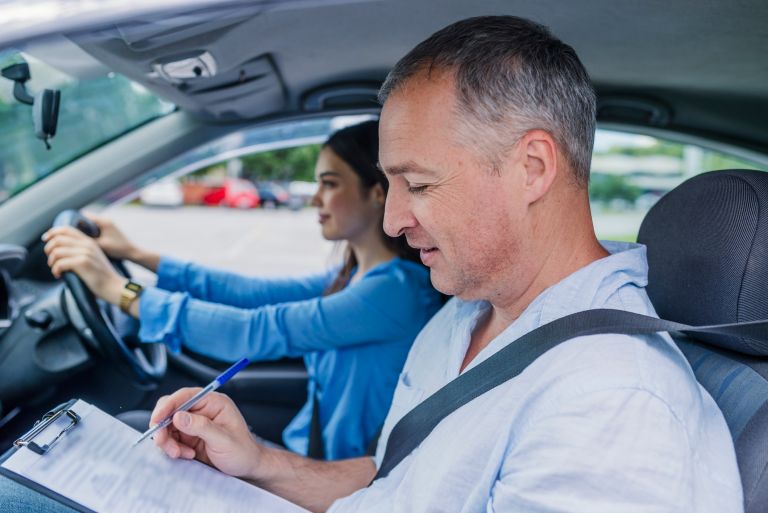 Woman sitting driver test 