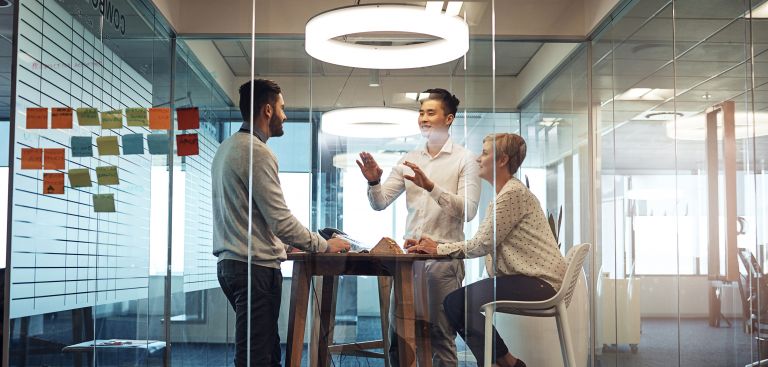 Three people in an office