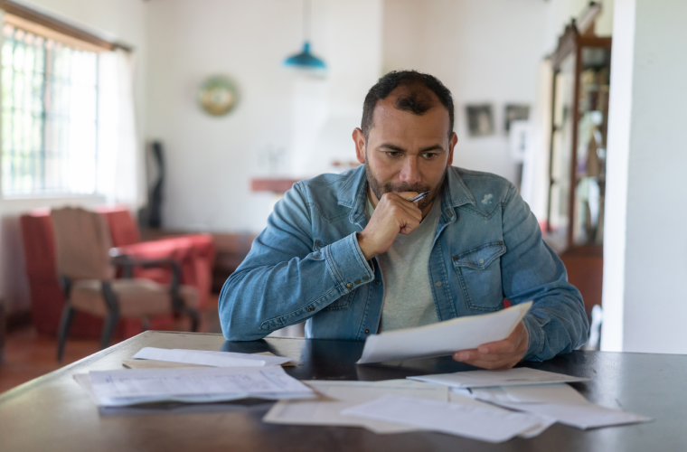 Man looking at paperwork