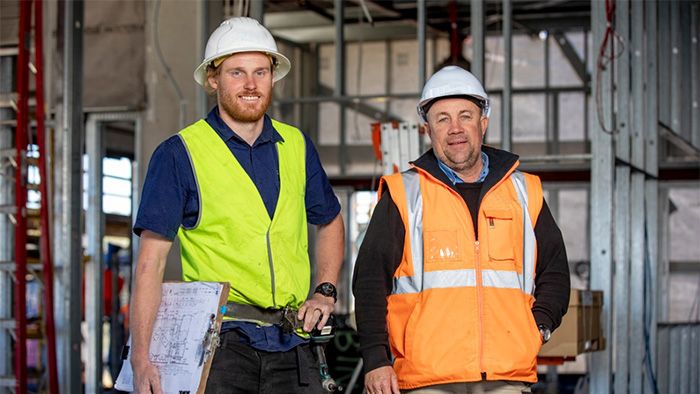 Male supervisor and apprentice