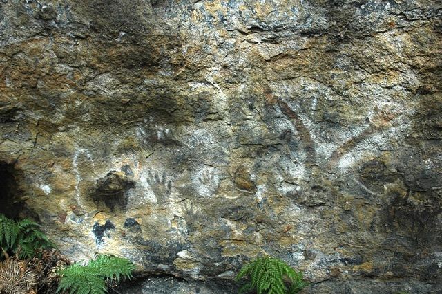 Aboriginal artwork on rock wall