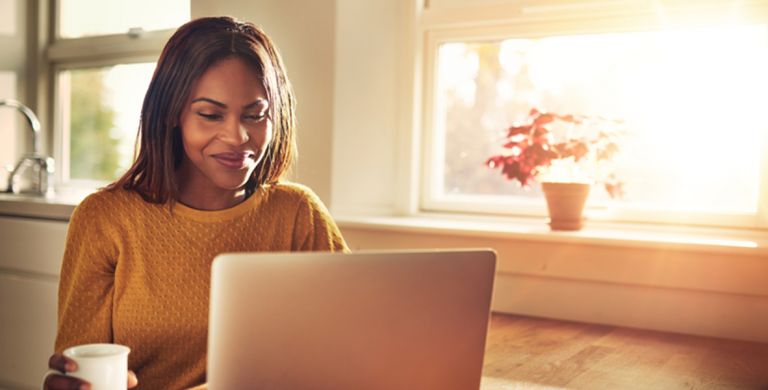 Gig State grants woman on laptop typing