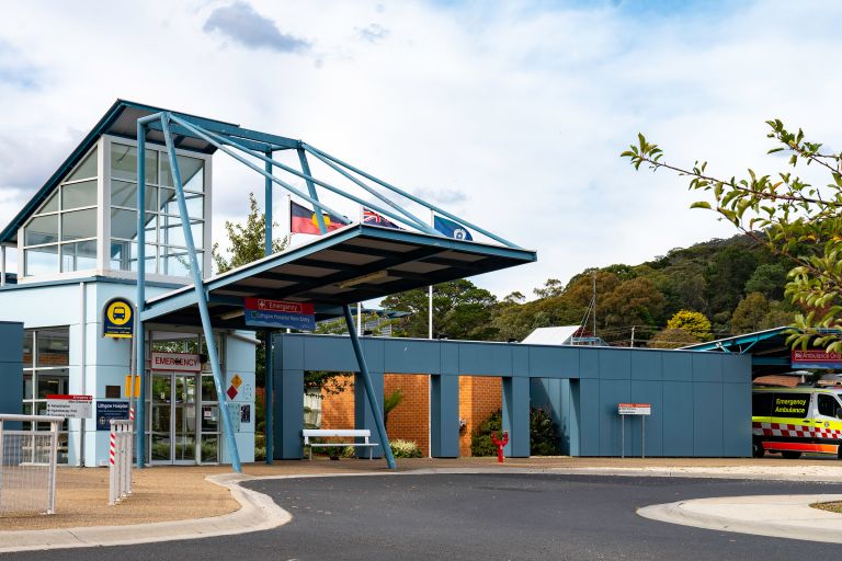 Photo of front emergency department entry to a modern hospital building