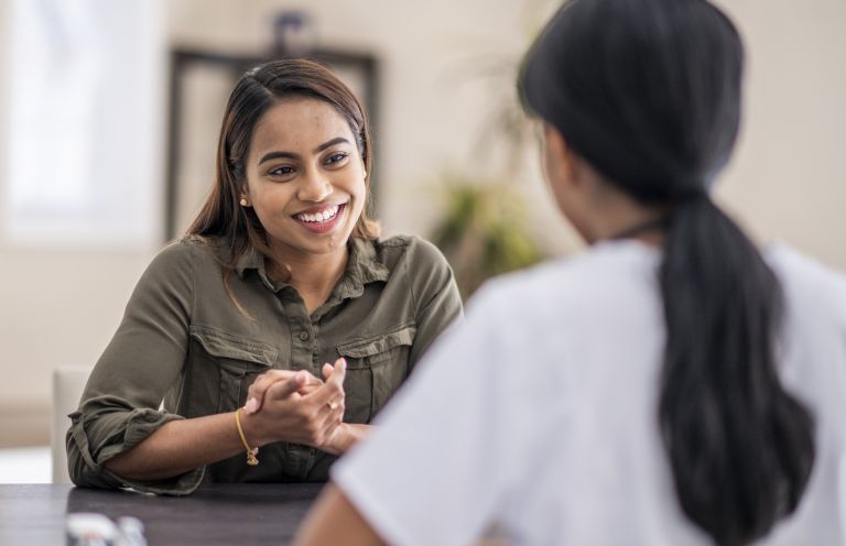 Two women talking