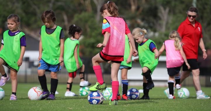 Girls playing soccer