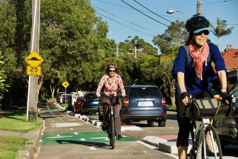 Two cyclists riding on Railway Avenue 