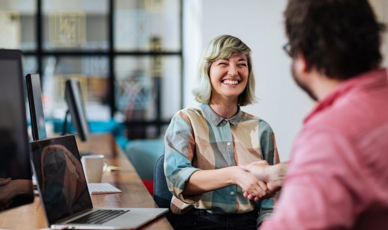 Two people shaking hands