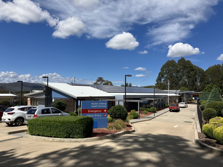 Main entry to the Batlow-Adelong Multipurpose Service. A sign indicating the main and emergency entry points is in the centre of the image.