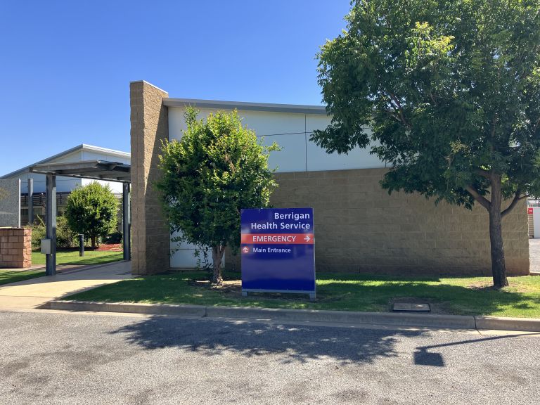 Main entry to the Berrigan Multipurpose Service. A sign indicating the main and emergency entry points is toward the centre of the image.