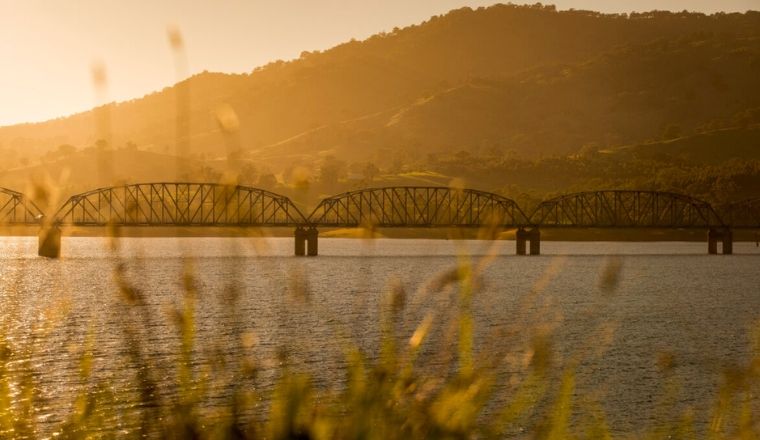 A view of Bethanga Bridge Belbridge during sunset