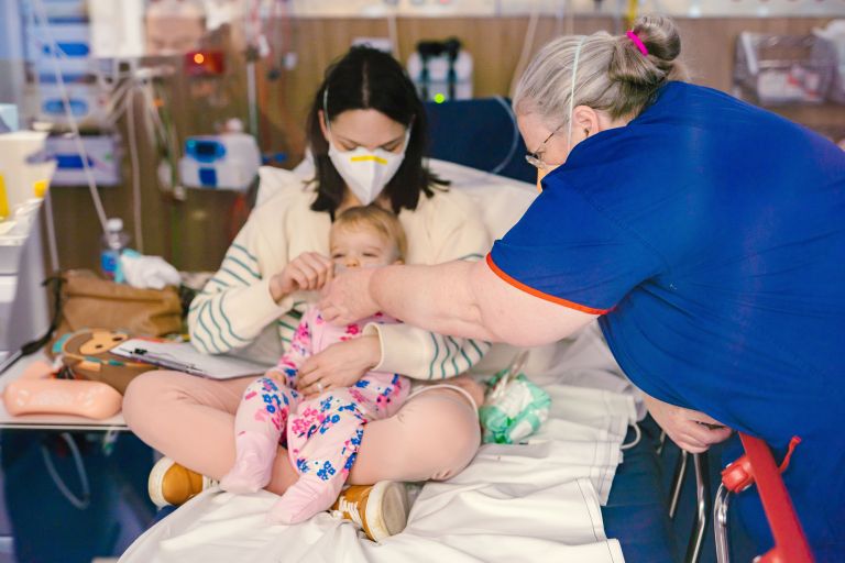 Southern NSW nurse with mother and child