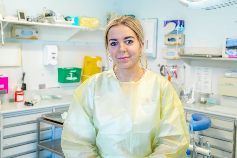 Oral health worker smiling at camera in SNSWLHD