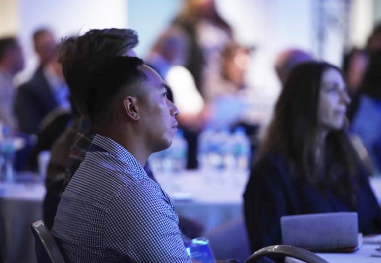 Attendees sitting around a table at the 2023 SmartNSW Masterclass event.