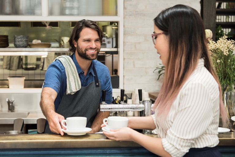 Colleagues working at a coffee shop