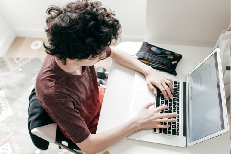 Home schooled child with laptop