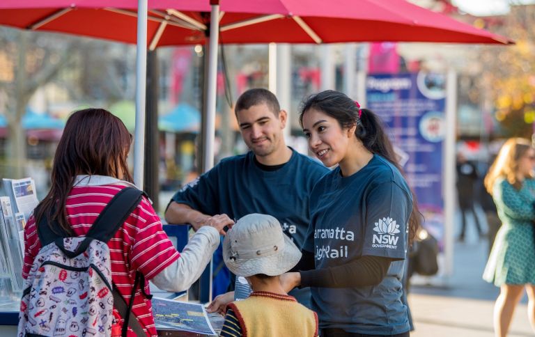 Community members and Parramatta Light Rail employees at the information stand.