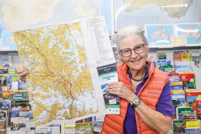 Person holding a topographic map of the Parramatta region.