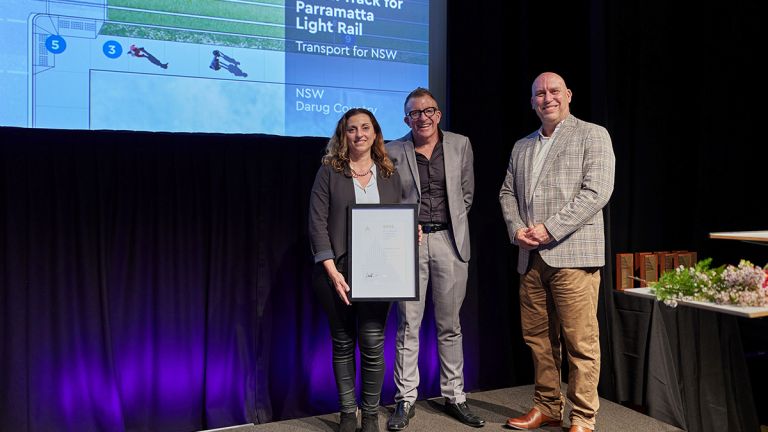 Parramatta Light Rail Stage 1 team holding an award at the 2022 National Landscape Architecture Awards.