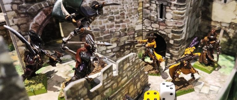 Plastic figurines and dice on tabletop