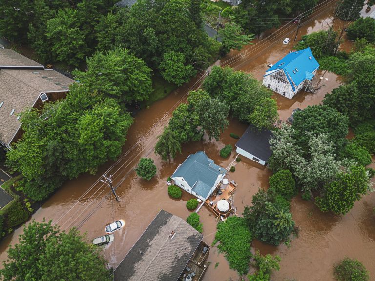 Aerial view of a street that is inundated with flood water