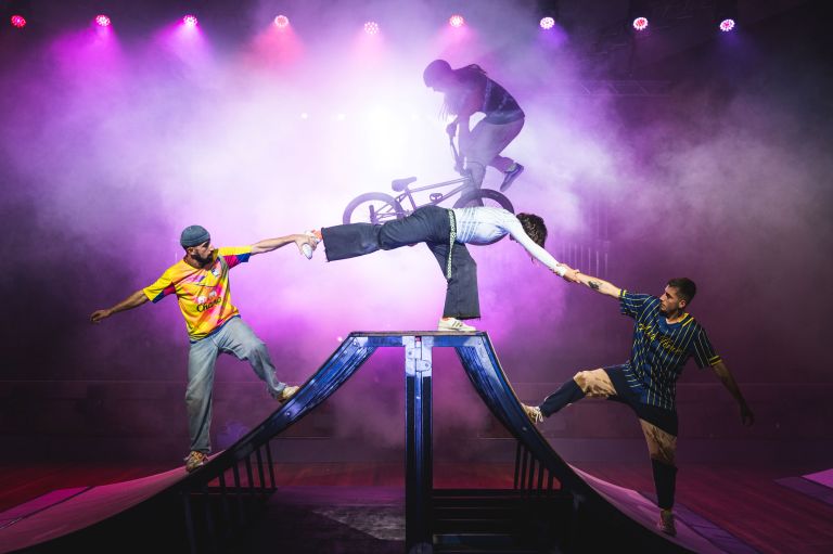 BMX riders perform stunts in live theatre