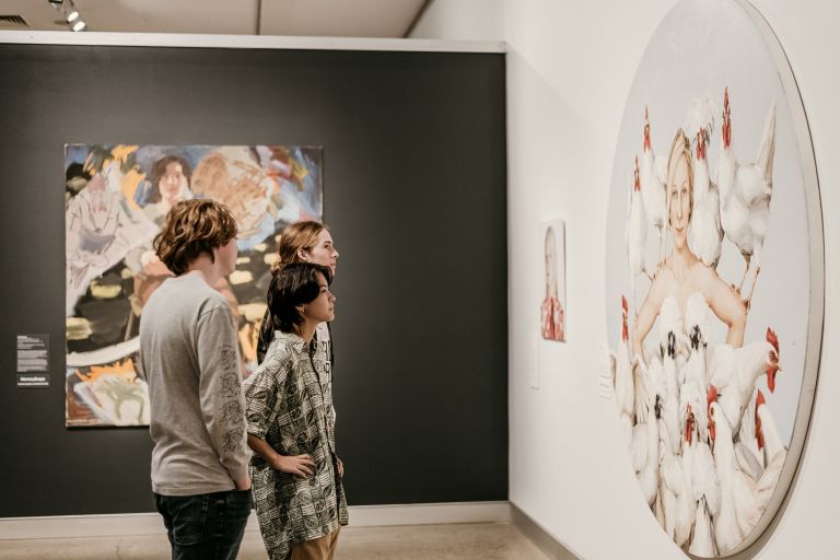 young people looking at an artwork in Tweed Regional Gallery