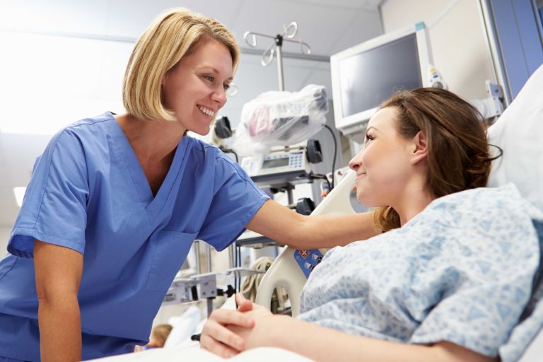 Nurse with a patient in hospital 