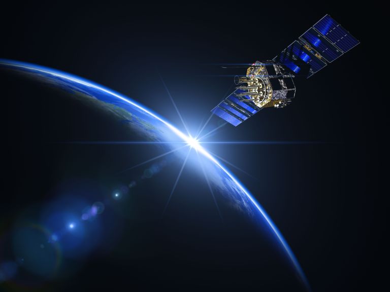 Concept image of a satellite in space rotating around the earth