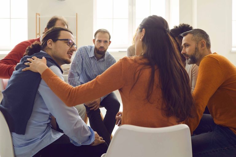 A group of people giving each other support 