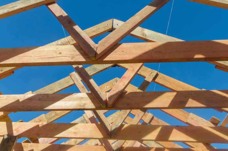 Wooden beams of a house roof under construction