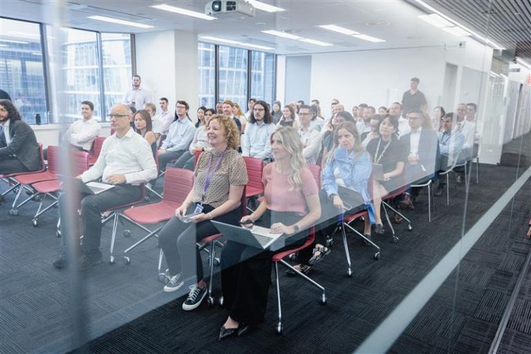 NSW Treasury staff in a meeting room