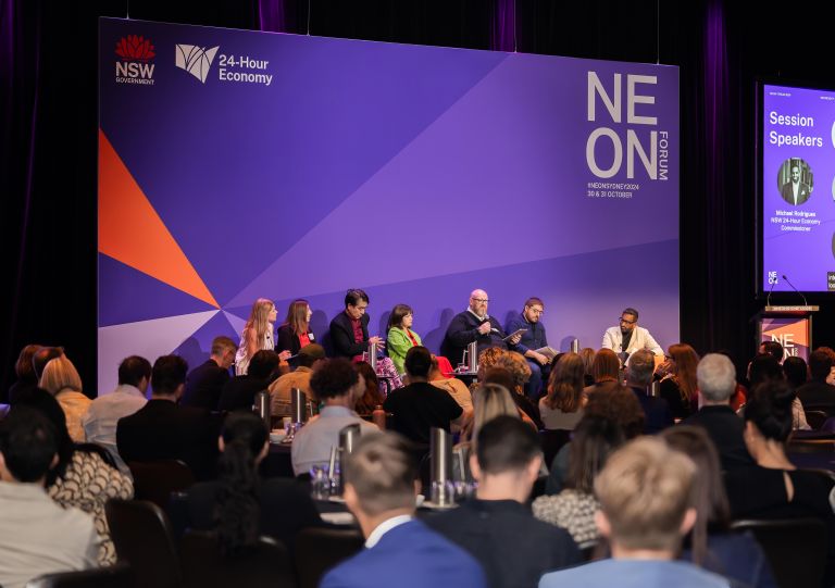 Crowd of people watching a panel at NEON Forum 2024, Sydney Masonic Centre