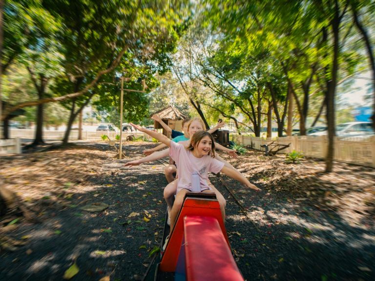 Children riding on the miniature train