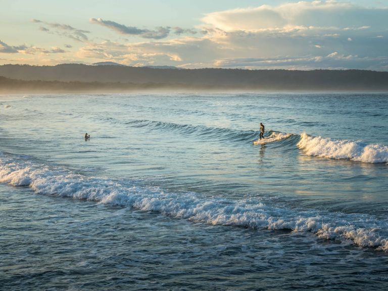 Surfing at Tathra Beach