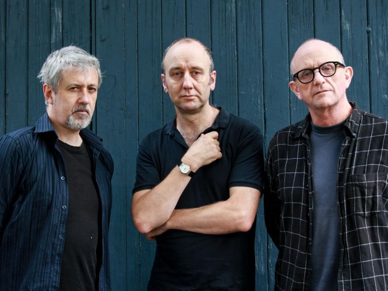 The Necks band stand together