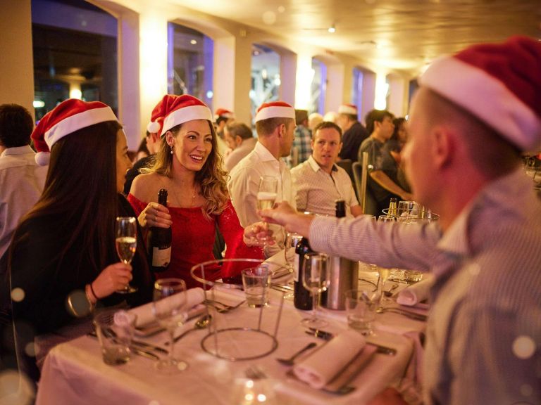 Guests celebrating a Christmas party on the iconic Sydney Showboat on the harbour.