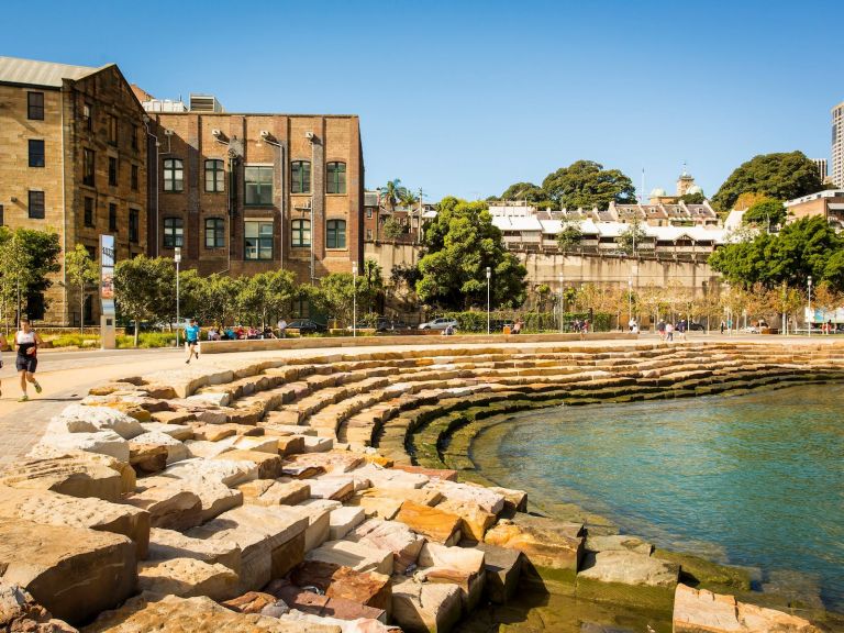 Men running through by Nawi Cove, Barangaroo Reserve, Barangaroo