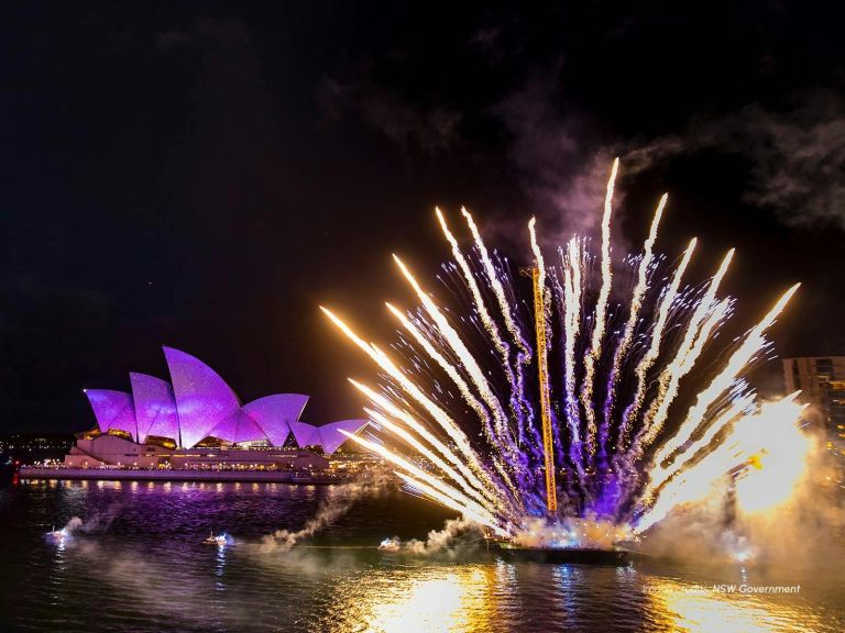 Fireworks launched in synchrony with the Opera House projections on Australia Day