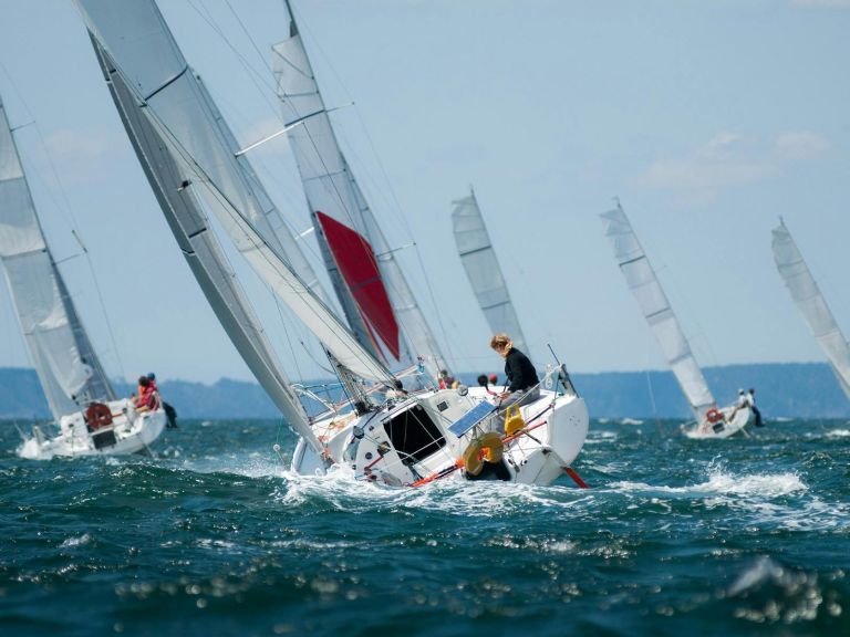 The sailors giving it their all during the annual Sydney-Hobart Boxing Day Yacht Race .