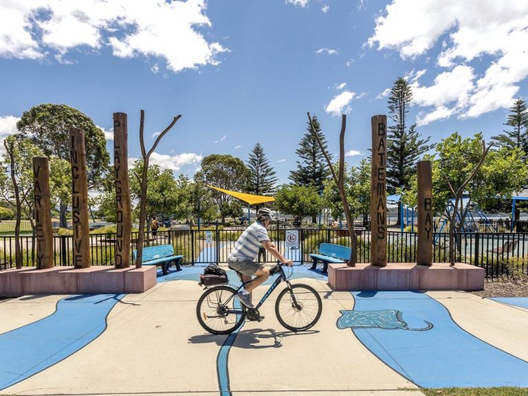 Cycling near Corrigans Reserve and accessible playground