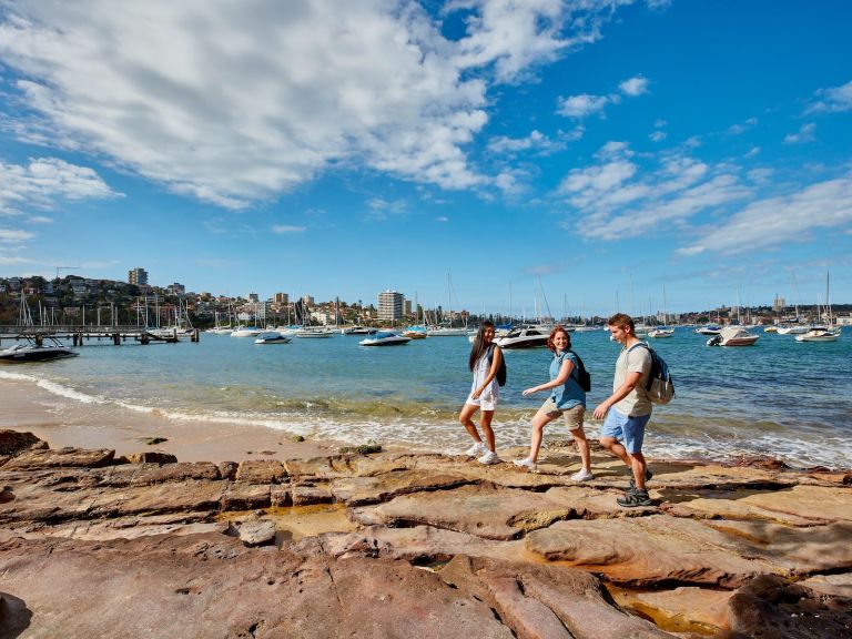 Friends enjoying a walk along Forty Baskets Beach, Balgowlah