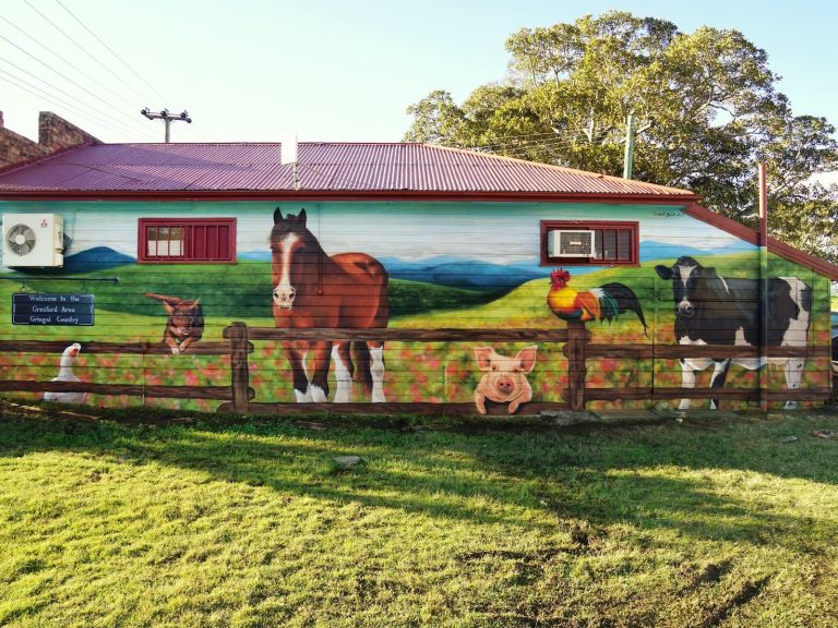 Mural of farm animals on the side of the butchers in Gresford. Painted by Dan Bianco