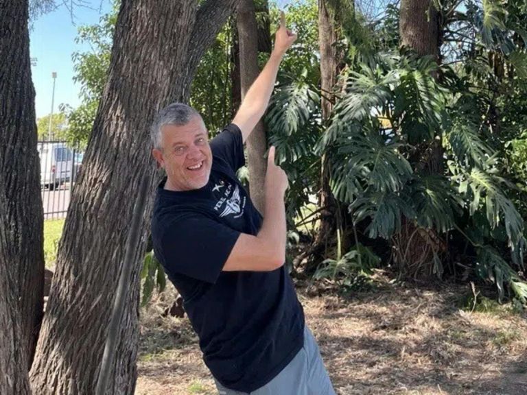 Mick Roderick spotting birds in the grounds of Maitland Regional Art Gallery