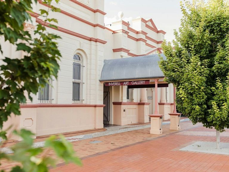 Outside front view of Art Gallery and entrance awning with footpath running along front.